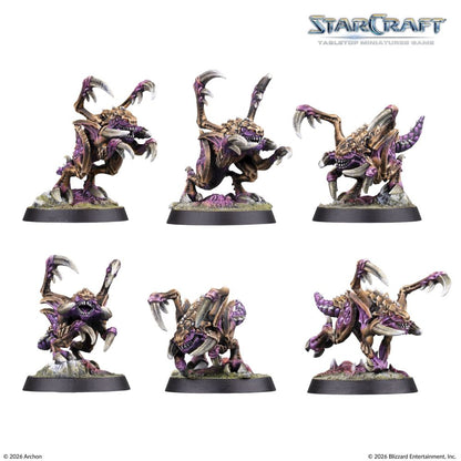 Painted StarCraft Zergling miniature examples in different poses