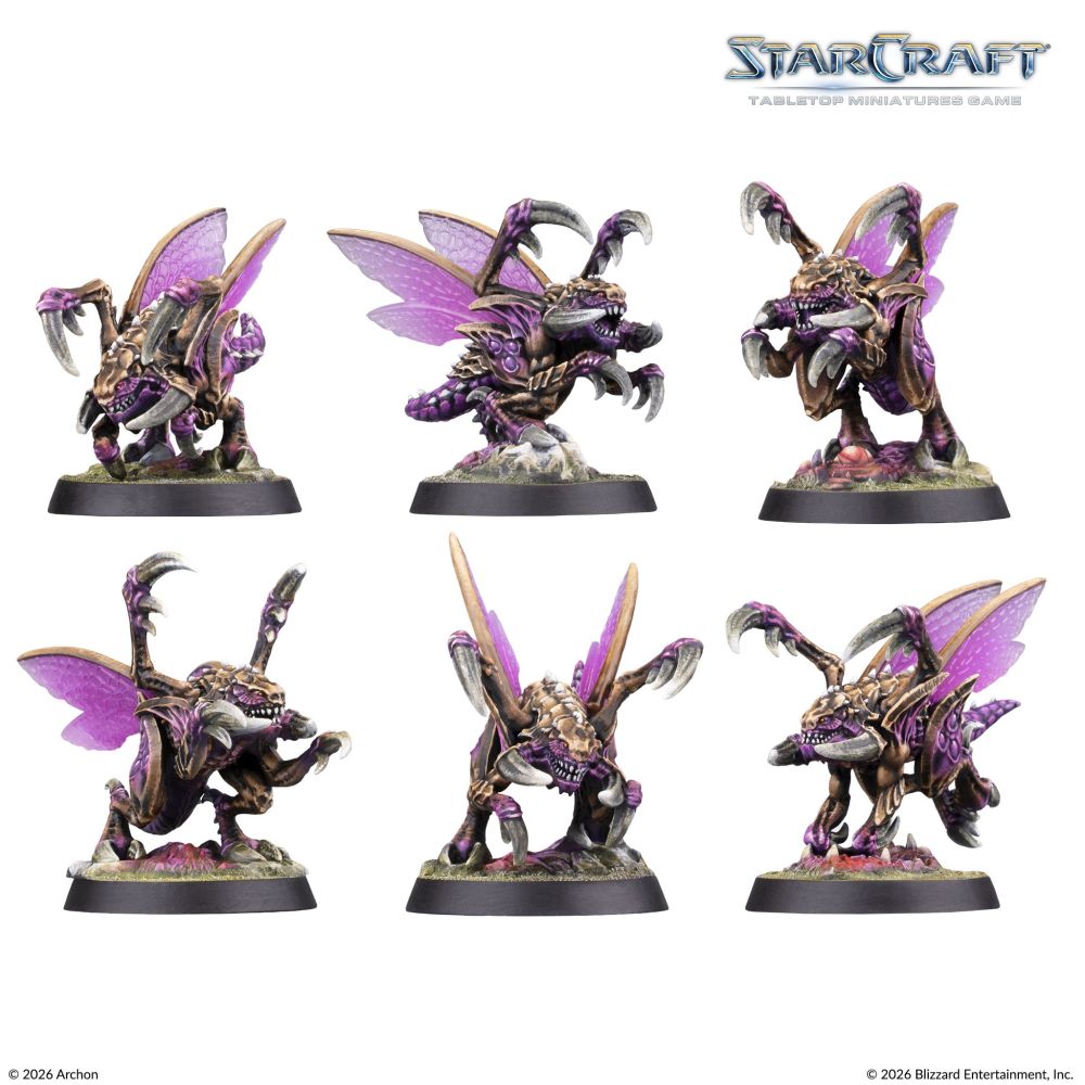 Painted StarCraft Zergling miniatures showing wings and different poses