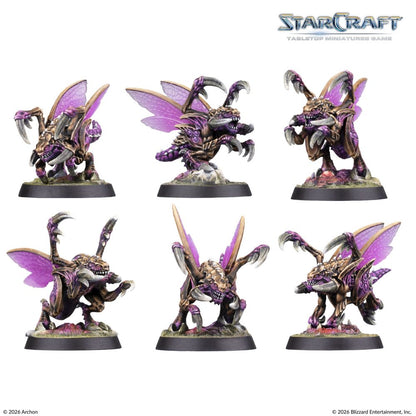 Painted StarCraft Zergling miniatures showing wings and different poses