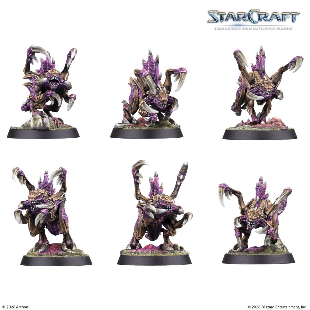 Painted StarCraft Zergling miniature examples with raised claws