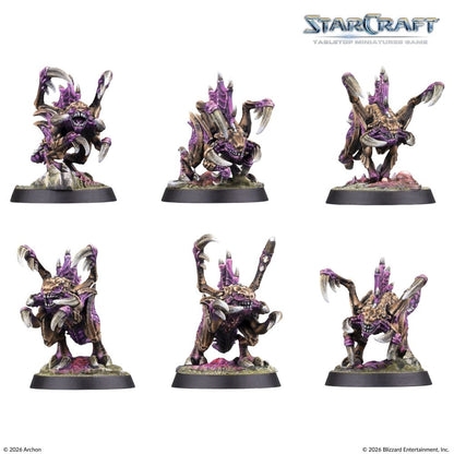 Painted StarCraft Zergling miniature examples with raised claws