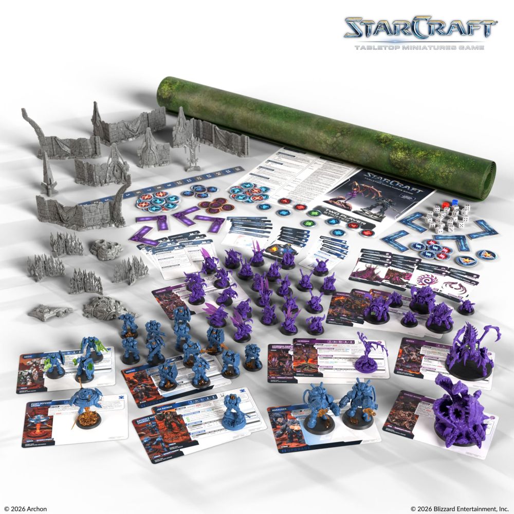 StarCraft starter set contents with Terran and Zerg miniatures, terrain, playmat and accessories