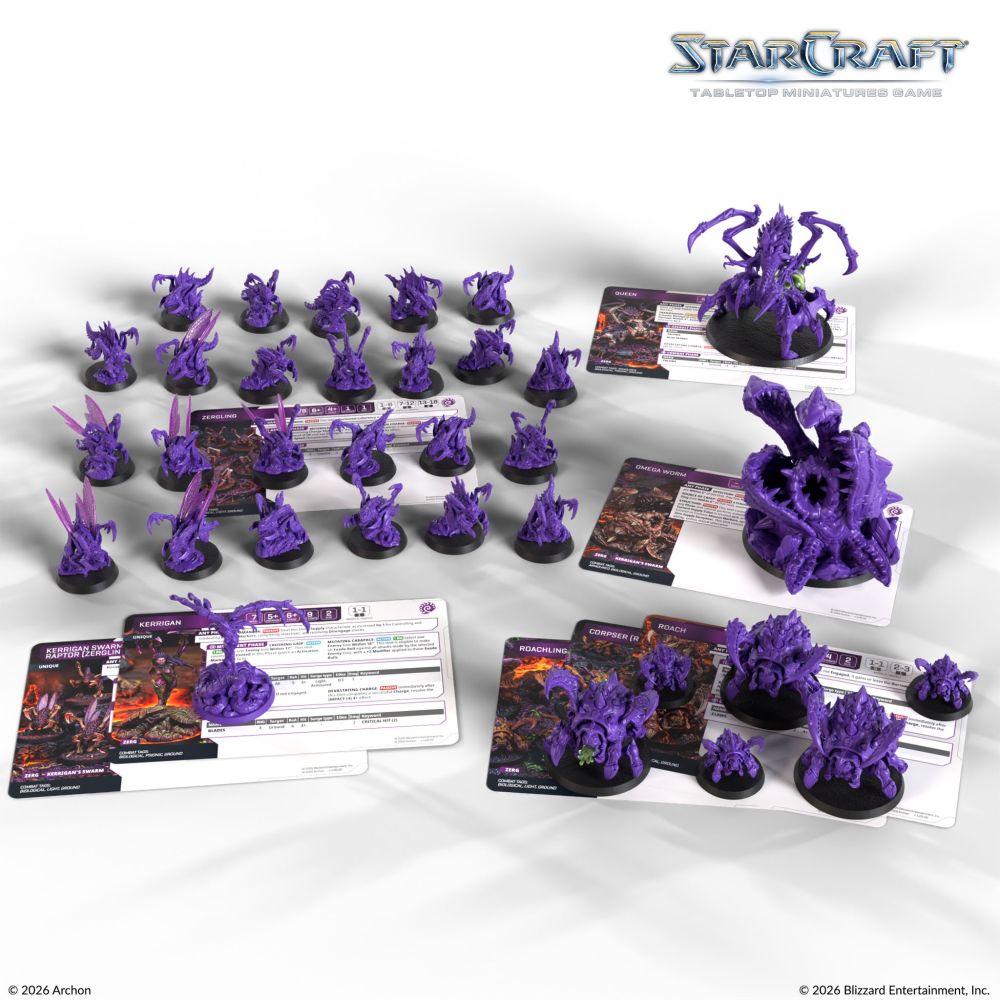 Zerg starter force with purple miniatures and unit cards
