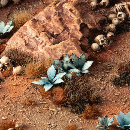 Miniature terrain featuring assembled Blue Agave laser-cut plants integrated into a realistic scenic landscape.