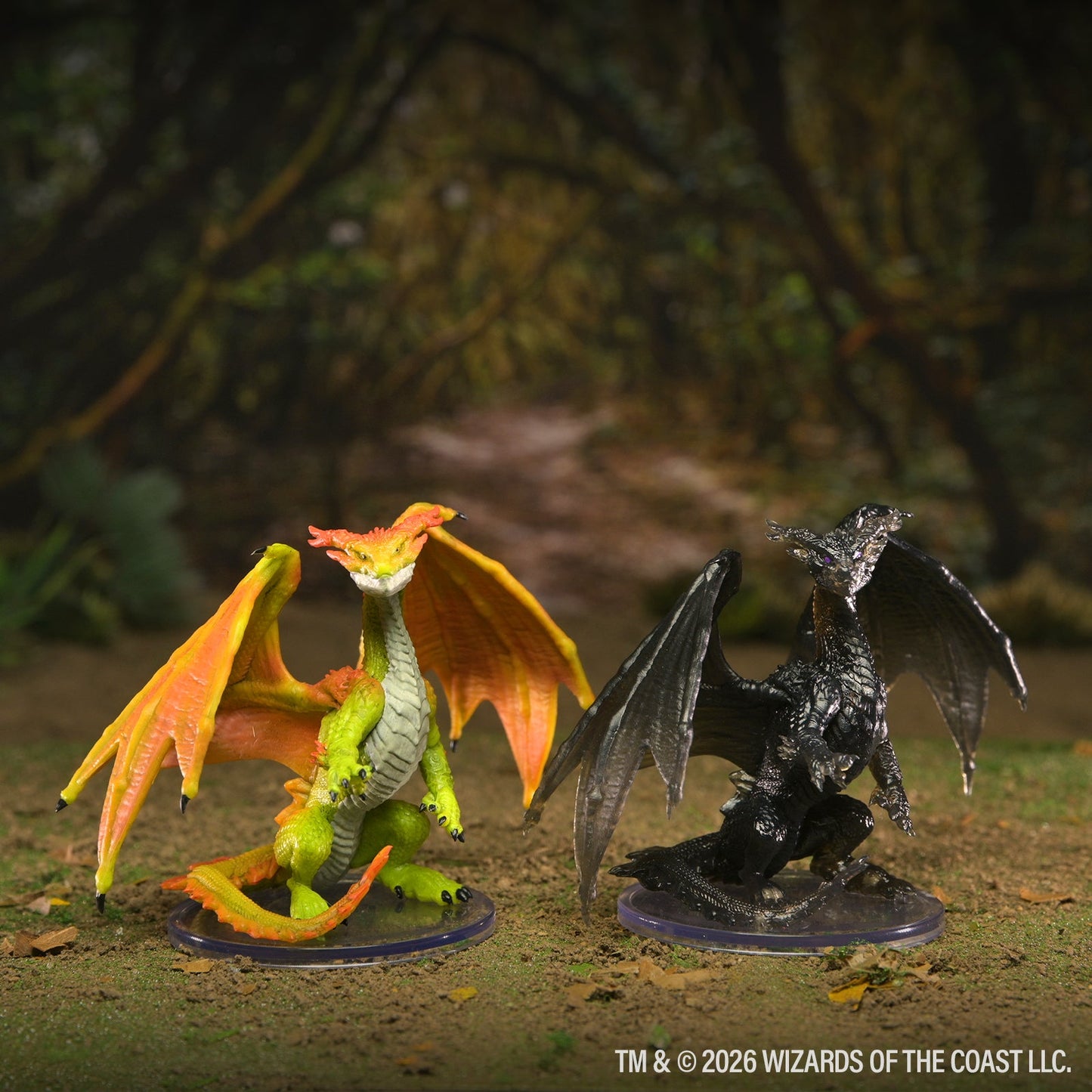 D&D Adventures in Faerûn black and green dragon miniatures in a forest