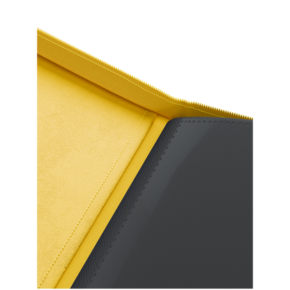 Yellow 4 pocket zip binder holding 160 trading cards