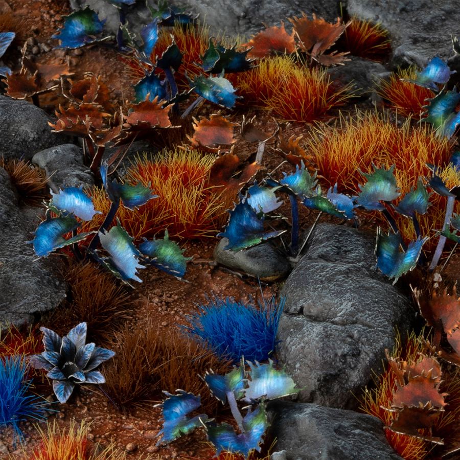 Miniature terrain featuring assembled Alien Flytrap laser-cut plants integrated into a realistic scenic landscape.