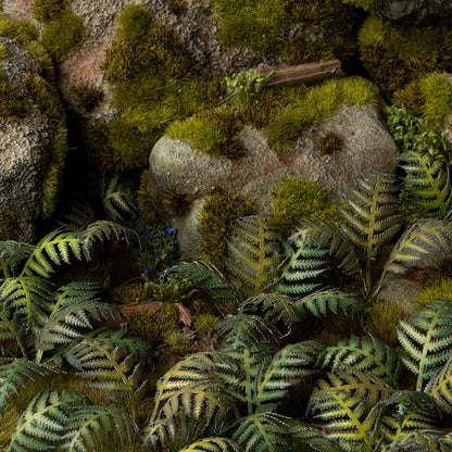 Miniature terrain featuring assembled Bracken laser-cut plants integrated into a realistic scenic landscape.