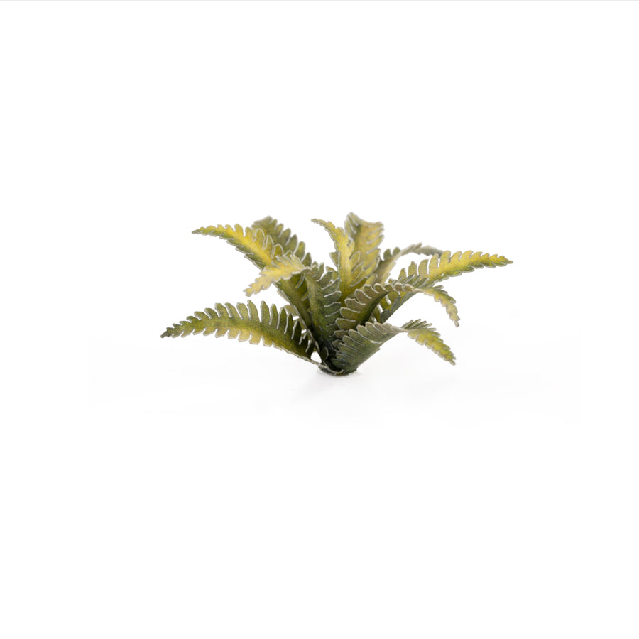 Miniature terrain featuring assembled Deer Fern laser-cut plants integrated into a realistic scenic landscape.