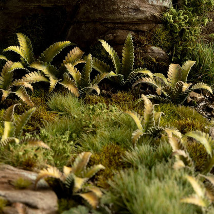 Miniature terrain featuring assembled Deer Fern laser-cut plants integrated into a realistic scenic landscape.