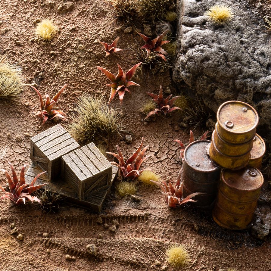 Miniature terrain featuring assembled Red Aloe laser-cut plants integrated into a realistic scenic landscape.