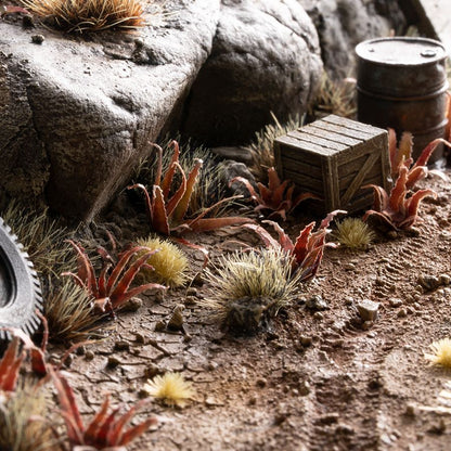 Miniature terrain featuring assembled Red Aloe laser-cut plants integrated into a realistic scenic landscape.