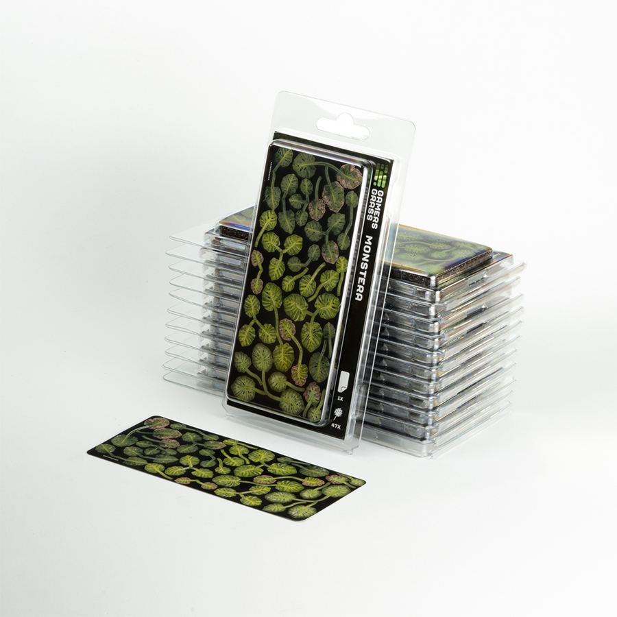 Laser Plants Monstera blister pack displayed with assembled Monstera plants showing the finished miniature foliage.